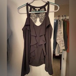 Dark grey sexy top with black lace back details. Size 0 but fits like a L.